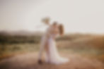 Bride and groom wedding photo. Liz Martinez gown from The Wedding Gown bridal shop.